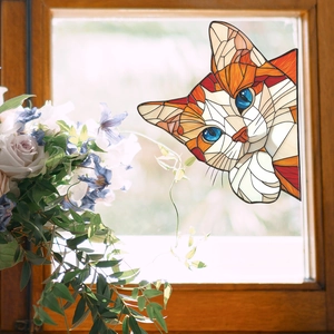 Cartoon orange cat stained glass window sticker with vibrant blue eyes for home decor