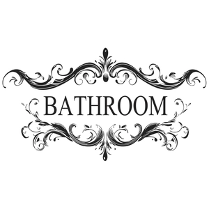 Macro detail of black vintage bathroom wall decal with elegant scroll patterns