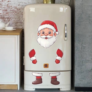 Detailed view of cartoon Santa Claus stickers applied on a vintage cream refrigerator