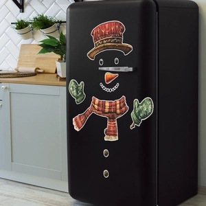 Christmas snowman refrigerator stickers set with red hat and green gloves on black fridge