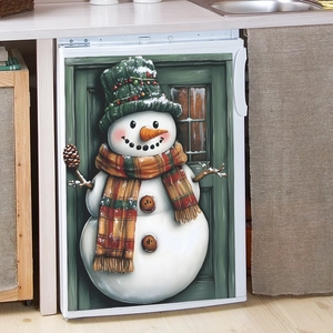 Detail of cute Christmas snowman fridge sticker on a white refrigerator with festive vibes