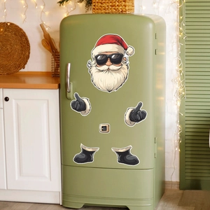 Detailed view of cool Santa Claus magnets on a vintage green fridge for Christmas decor