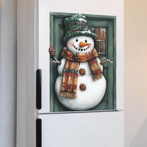Christmas snowman fridge sticker with green hat and plaid scarf on a white refrigerator surface
