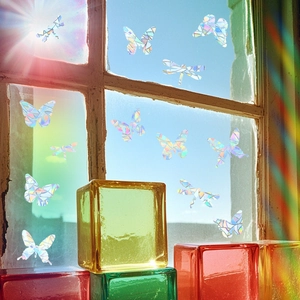 Detail of laser butterfly and dragonfly window stickers with rainbow prism effects