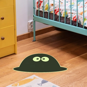Cute black monster wall decal for living room entry decoration in nursery setting