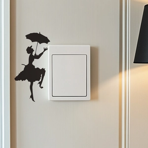 Elegant silhouette of Mary Poppins with umbrella wall sticker on a light wall