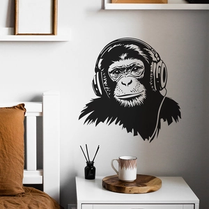 Close-up of creative gorilla wall sticker with headphones in a modern bedroom setting