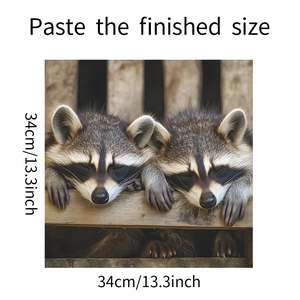 Detailed 34cm square diamond painting showing two cute sleeping raccoons on white background