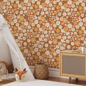 Detail of vintage floral self-adhesive wallpaper in a warm caramel nursery setting