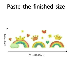 Detail view of rainbow and crown wall stickers showing paste finished size measurements
