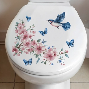 Detail showing waterproof floral and bird wall decals applied to a white toilet lid