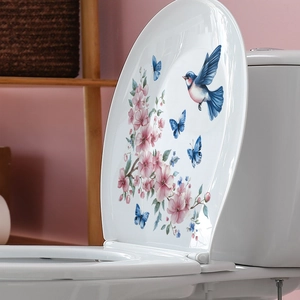 Self-adhesive toilet lid sticker with watercolor pink flowers, blue bird and butterflies
