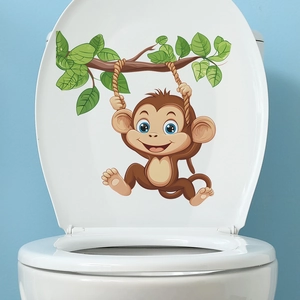 Playful cartoon monkey on branch wall sticker for bathroom toilet lid decoration