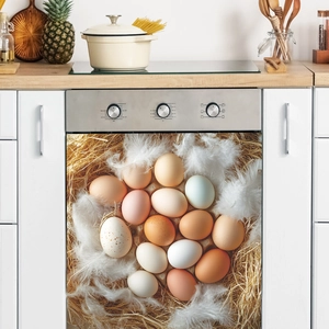 Realistic chicken eggs and white feathers nest wall sticker on a modern kitchen oven door