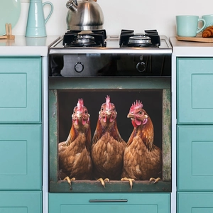 Three farm roosters dishwasher magnet cover with rustic green wood frame on steel oven