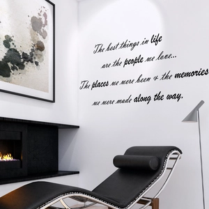 Inspirational vinyl wall sticker with black cursive font in modern minimalist living room