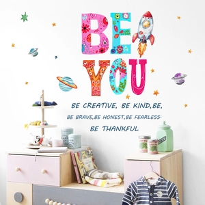 Colorful Be You wall decal with cartoon rockets and space elements for kids bedroom decor