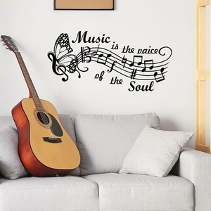 Adesivo murale con note musicali e farfalle con citazione La musica è l'anima