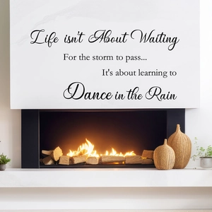 Minimalist black vinyl wall sticker with Life is about learning to Dance in the Rain quote