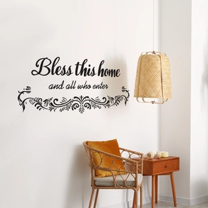 Self-adhesive black vinyl wall sticker with Bless this home quote and floral pattern
