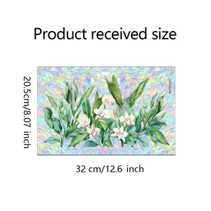 Detail view of floral window film showing lily patterns and 32x20.5 cm product dimensions