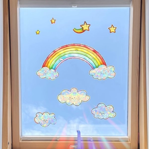 Rainbow prism sun catcher window film with cloud and star patterns for sunlit home decor