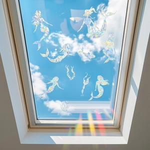 Rainbow prism mermaid window decals showing ocean theme stickers on a glass skylight