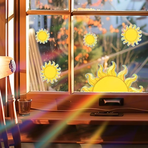 Rainbow sun catcher window stickers set showing sun shapes reflecting light on wooden frames
