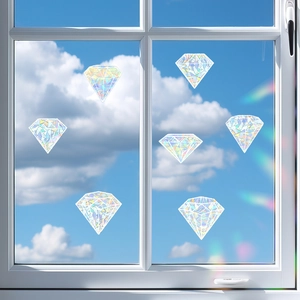 7-piece diamond shaped sun catcher window clings showing rainbow prism effects on glass