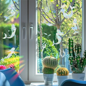 Rainbow prism window film set with mermaid and ocean creatures on sunlit glass
