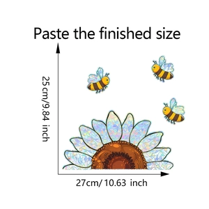 Detail view of sunflower and bee window clings with rainbow laser film and size markings