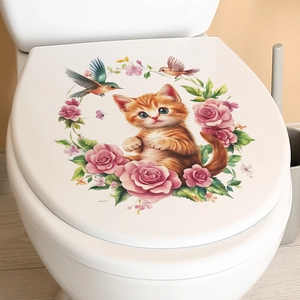 Détail d'autocollant chat roux et roses roses imperméable sur couvercle de toilette blanc