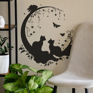 Sticker mural chat noir romantique avec lune et motifs floraux pour déco maison