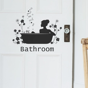 Creative black silhouette bathroom wall decal with woman in tub and text on white door