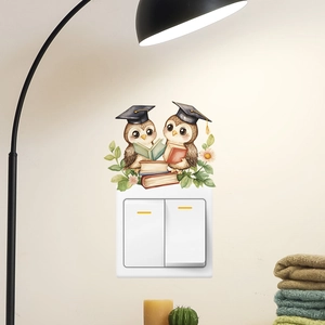 Cartoon owl light switch wall sticker featuring owls reading books in watercolor style