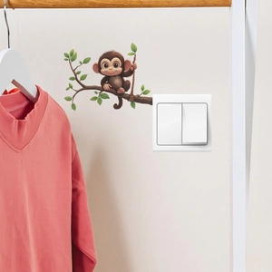 Sticker mural singe de dessin animé sur branche pour chambre d'enfant et interrupteur