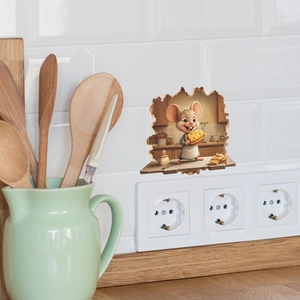 Detailed view of a 3D cartoon mouse wall sticker holding cheese on white tiled kitchen wall