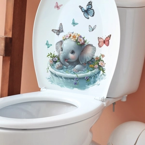 Cartoon elephant and butterflies sticker on a white toilet lid for bathroom decoration