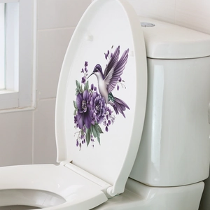 Floral toilet lid decal featuring a purple flower cluster and a flying hummingbird