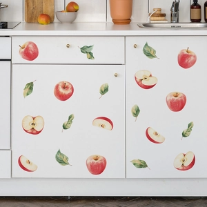 Stickers muraux pommes rouges et feuilles vertes sur des armoires de cuisine blanches