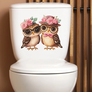 Cartoon owl toilet stickers with pink flowers on white tank with wood background
