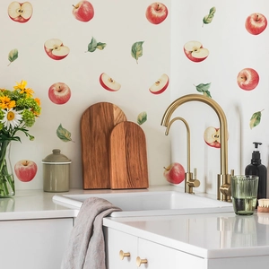 Stickers muraux pommes rouges pour cuisine avec feuilles vertes et design de pommes tranchées