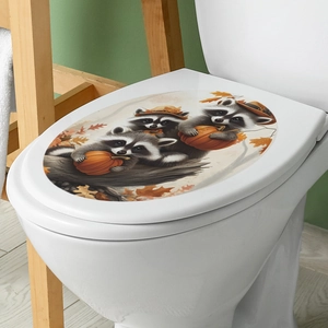 Detail of cartoon raccoon and pumpkin bathroom sticker with orange maple leaves