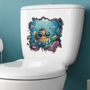 Detail of 3D sea world sticker with puffer fish and coral on white ceramic toilet