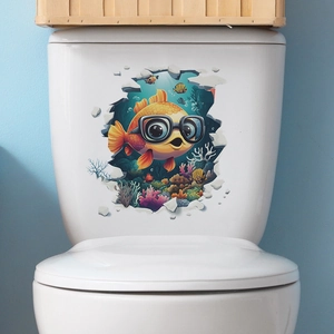 3D ocean world toilet sticker featuring cartoon goldfish with wall crack visual effect