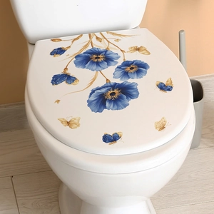 Elegant floral toilet seat decal with blue flowers and golden butterflies on white