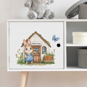 Sticker mural aquarelle maison de lapin pour chambre d'enfant sur meuble blanc