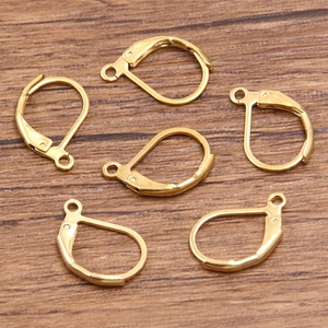 Detail view of six gold-plated stainless steel leverback earring hooks for DIY jewelry making