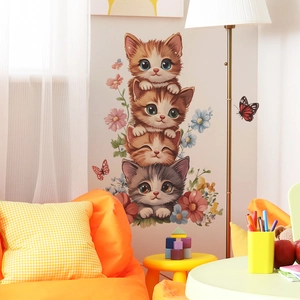 Cartoon cats wall sticker featuring stacked kittens and colorful flowers for home decor
