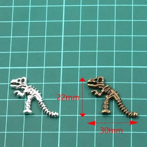 Set of 22x30mm dinosaur skeleton alloy pendants in silver and antique bronze finish